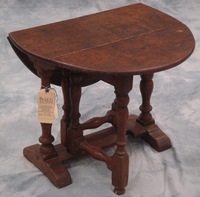 Appraisal: Miniature English oak gateleg trestle base table with baluster turned