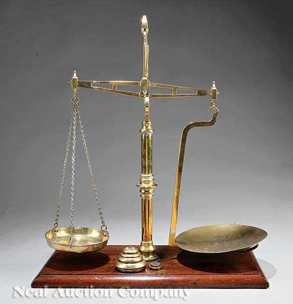 Appraisal: An Antique English Brass Scale marked Parnell Sons Bristol stackable