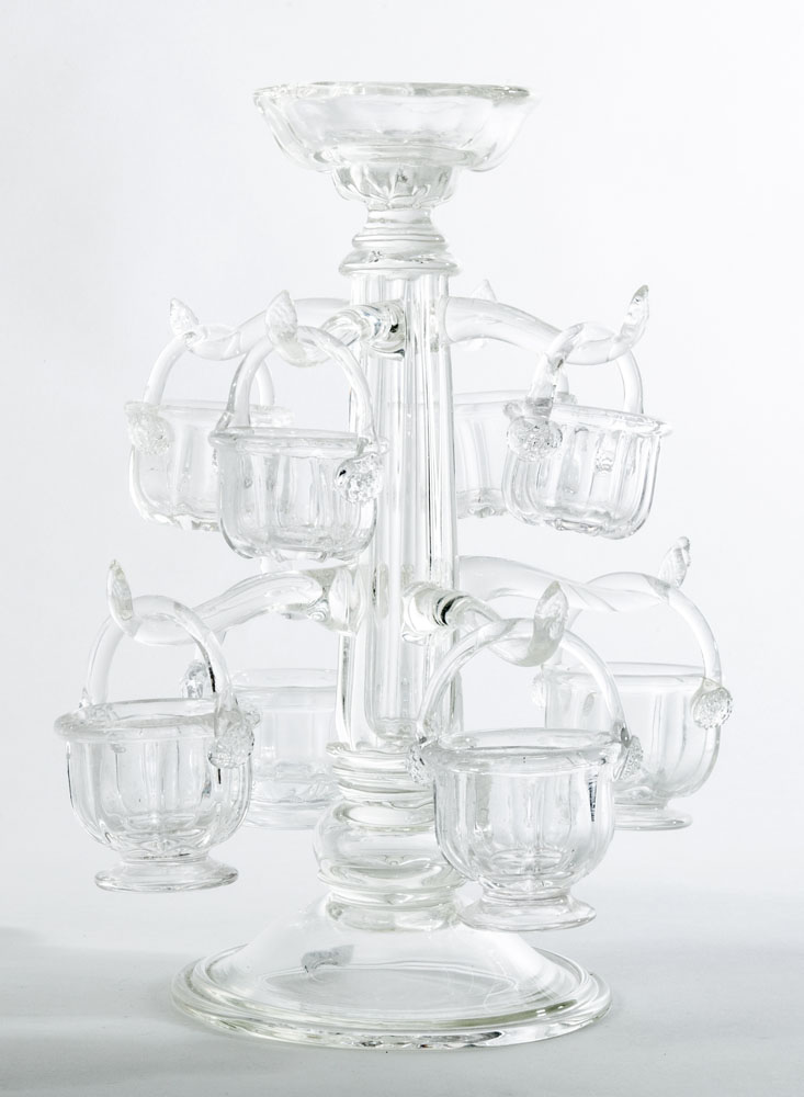 Appraisal: European Pressed Glass Eight-Arm Epergne Fitted with eight glass baskets