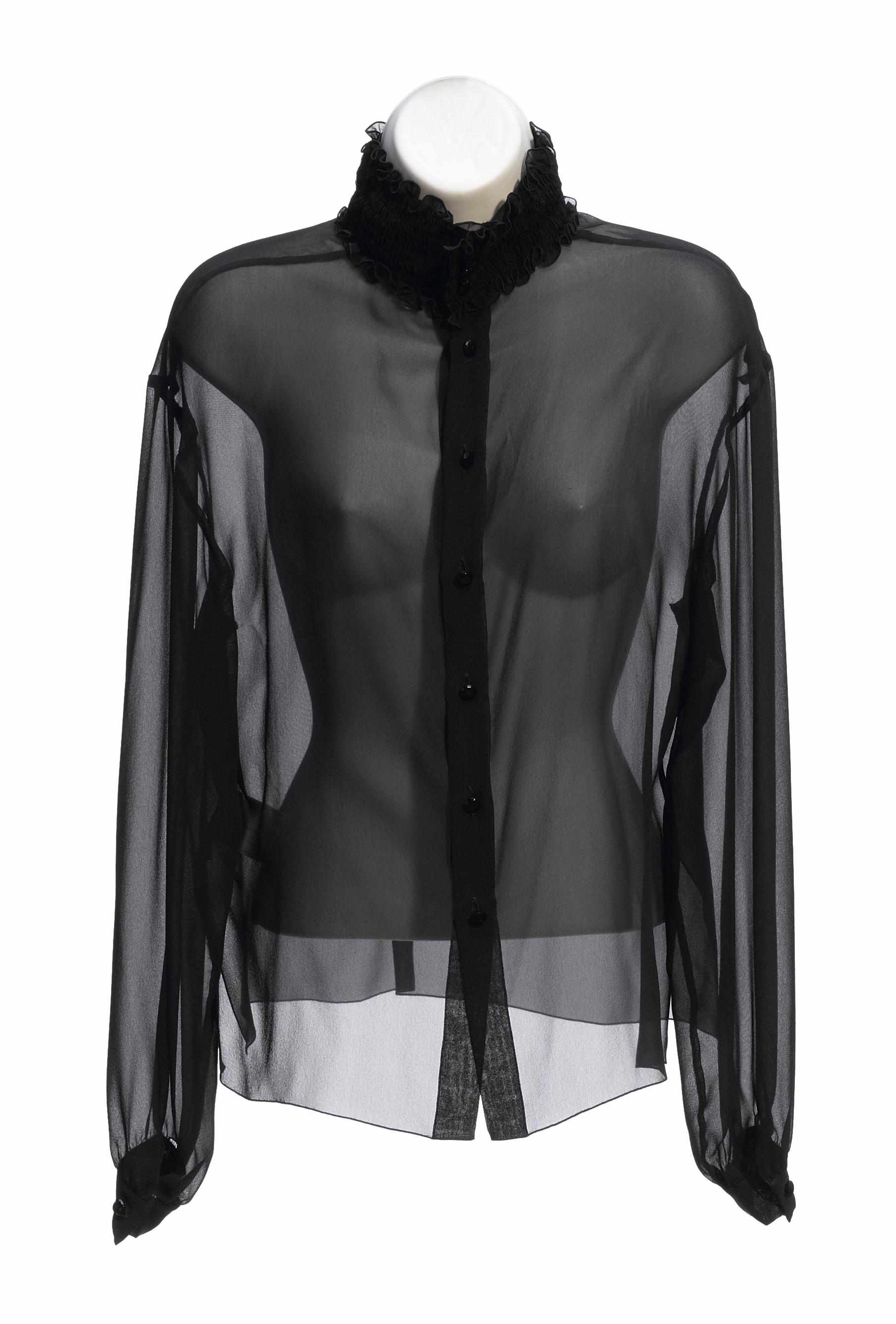 Appraisal: A Chanel sheer black silk blouse size together with black