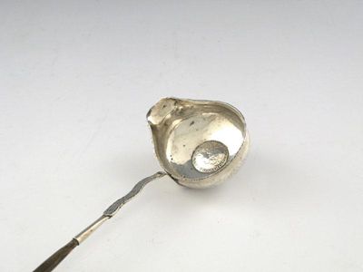 Appraisal: A late- th century silver toddy ladle the circular bowl