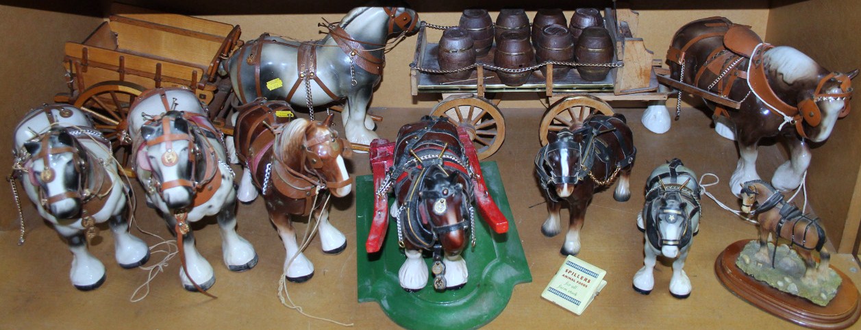 Appraisal: A collection of pottery figures of heavy horses various figure