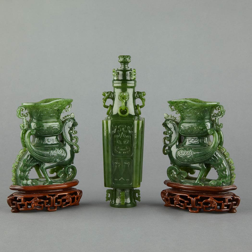 Appraisal: Pair of Chinese Spinach Jade Vessels Each carved as a