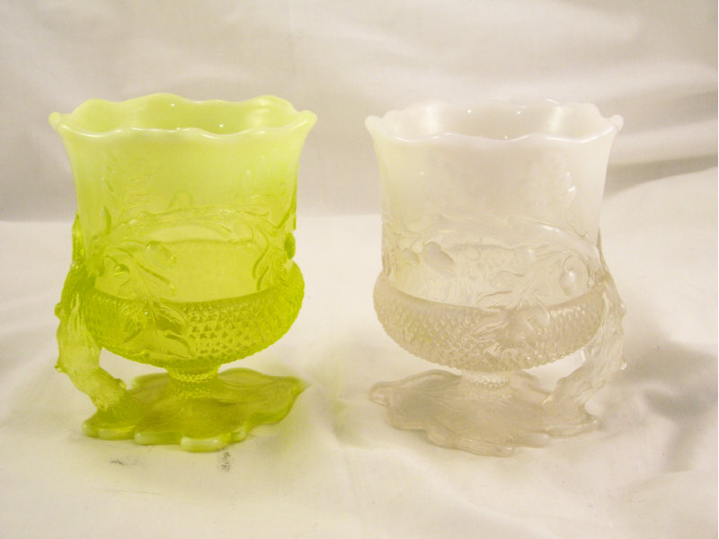 Appraisal: - Opalescent Patterned Glass Vases Includes two matching oak leaf