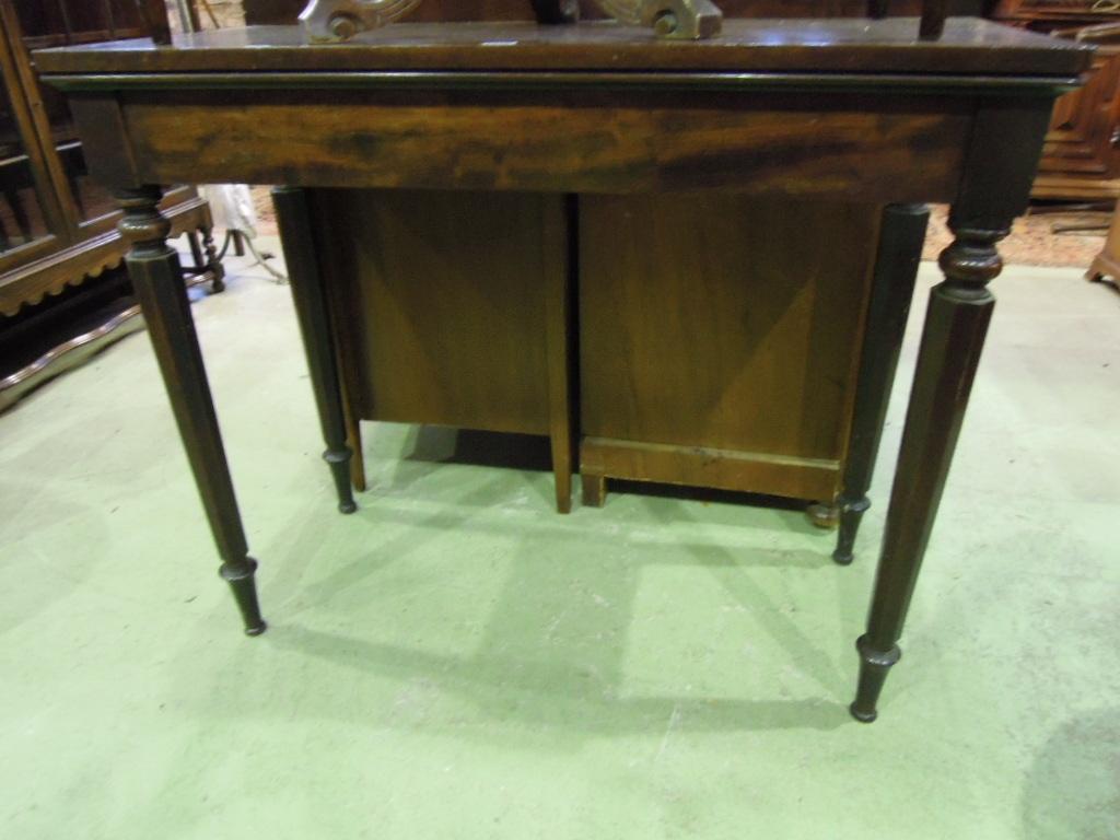 Appraisal: A th century mahogany hall table with shallow raised back