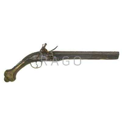 Appraisal: SOUTH AMERICAN FLINTLOCK PISTOL Heavily engraved barrel carved stock and