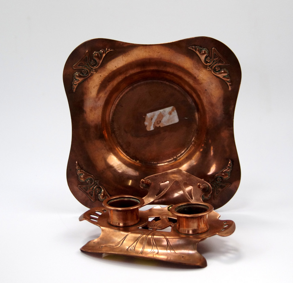 Appraisal: An Art Nouveau copper twin ink standish with square dish