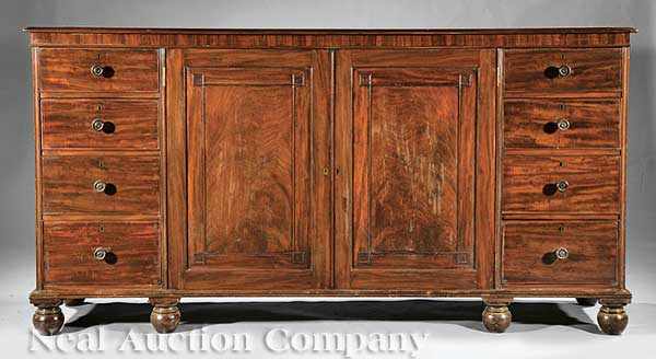 Appraisal: A Regency Carved Mahogany Linen Press c molded rectangular top