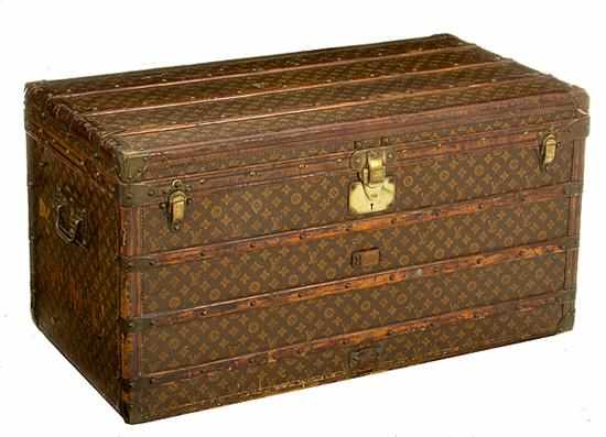 Appraisal: Louis Vuitton steamer trunk circa hinged rectangular top over conforming