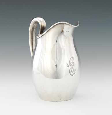 Appraisal: A Sterling Silver Water Pitcher by Wallace Simple design with