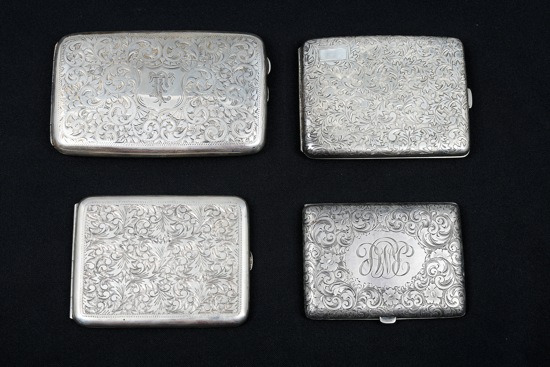 Appraisal: ENGRAVED ART NOUVEAU CIGARETTE CASES All having engraved scrolling foliate