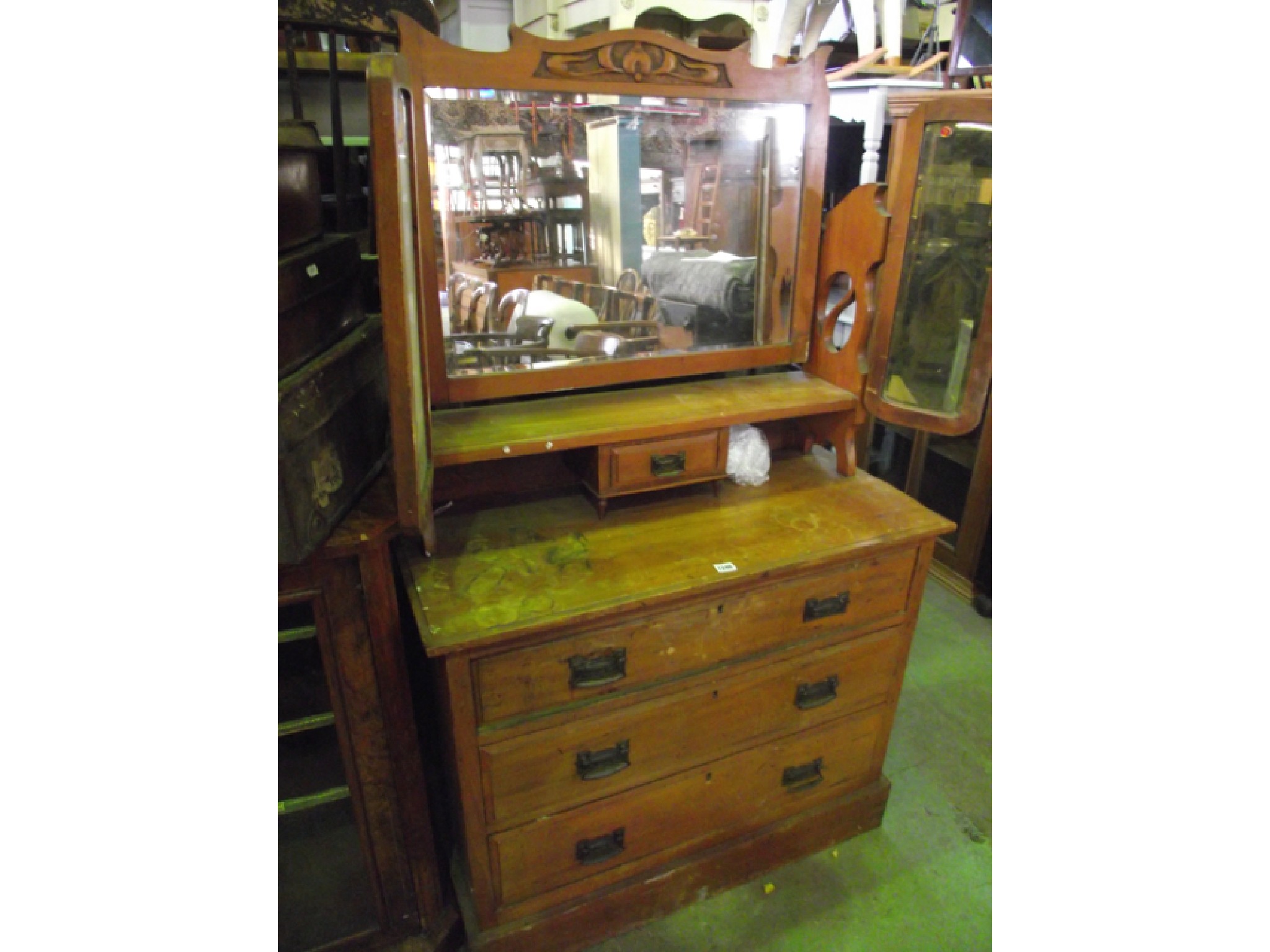 Appraisal: A satin walnut dressing chest the base fitted with three