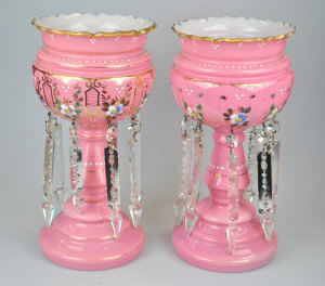 Appraisal: A pair of Victorian pink glass lustre cold painted with