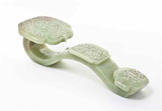 Appraisal: A Carved Hardstone Ruyi Scepter of celadon stone with a