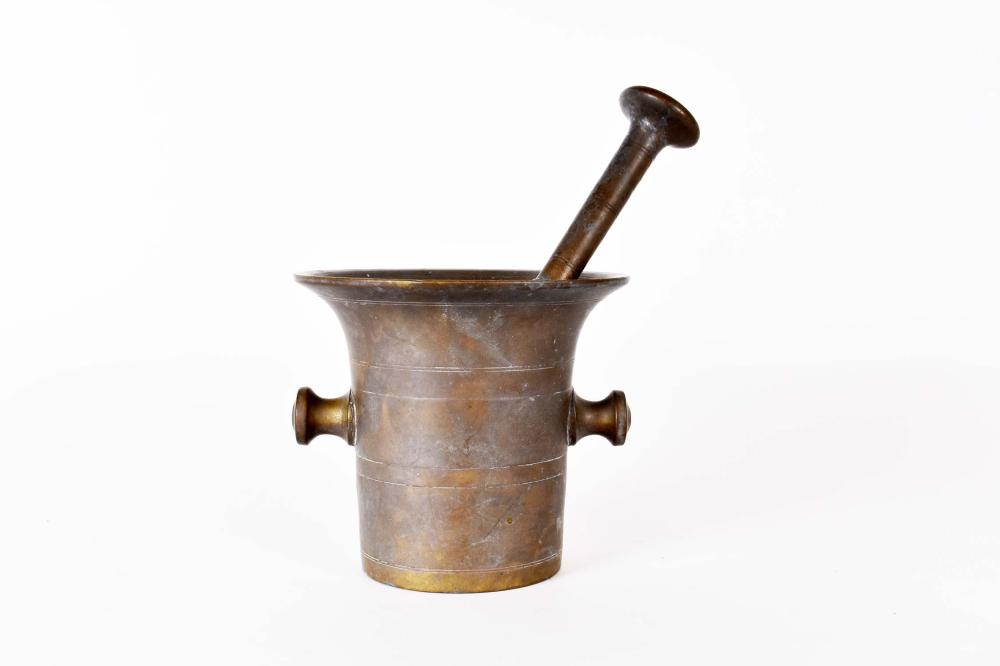 Appraisal: CONTINENTAL BRONZE MORTAR AND PESTLE th th Century Each piece