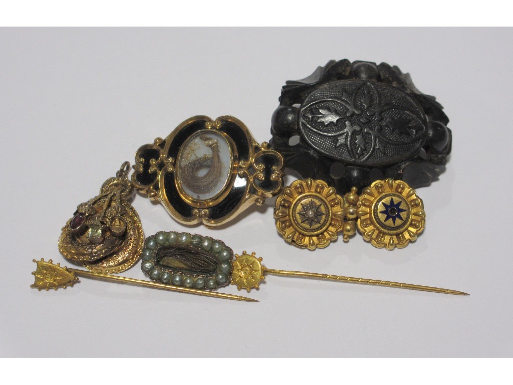 Appraisal: Lot comprising three Victorian yellow metal remembrance brooches an unmarked