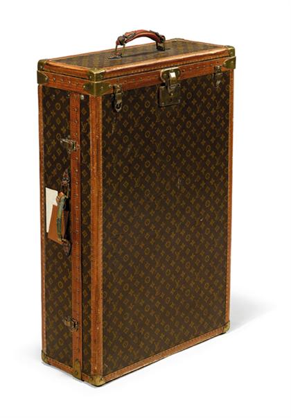 Appraisal: Louis Vuitton wardrobe trunk Of upright form the exterior covered