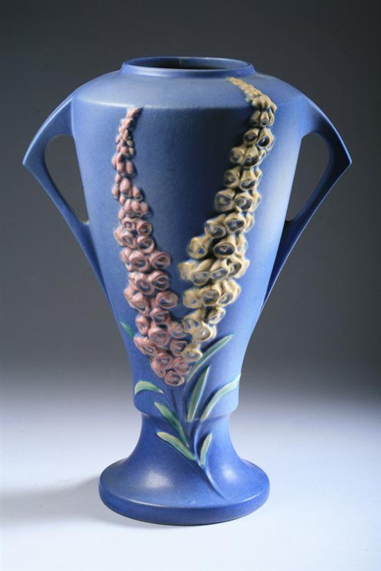 Appraisal: LARGE ROSEVILLE ART POTTERY FOXGLOVE BLUE VASE Raised Roseville U