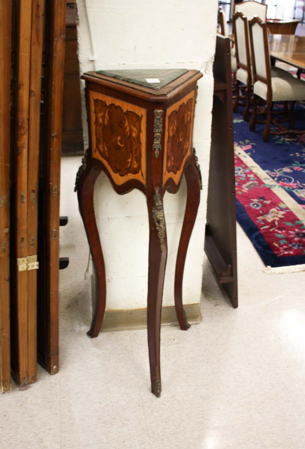 Appraisal: TRIANGULAR LOUIS XV STYLE PEDESTAL TABLE having a triangular inset