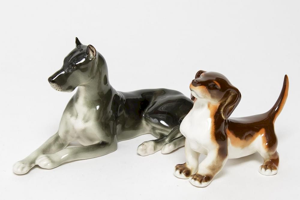 Appraisal: European Porcelain Dog Animalier Figurines European porcelain animalier th century