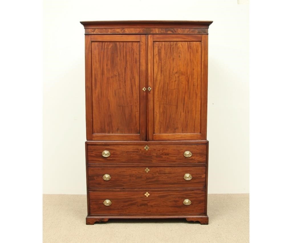 Appraisal: Georgian mahogany two-piece linen press circa with molded top and