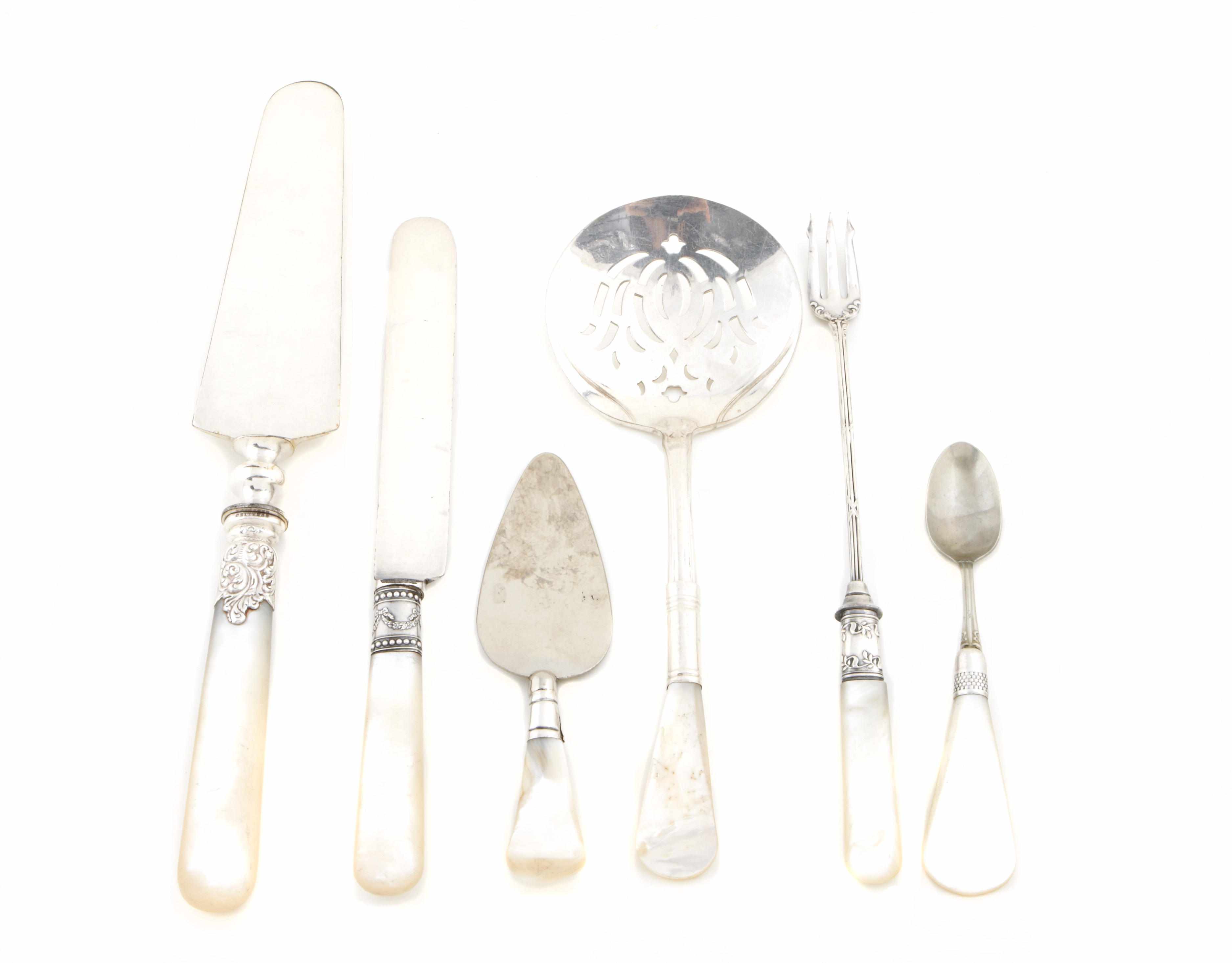 Appraisal: A group of mother of pearl handled dessert flatware and