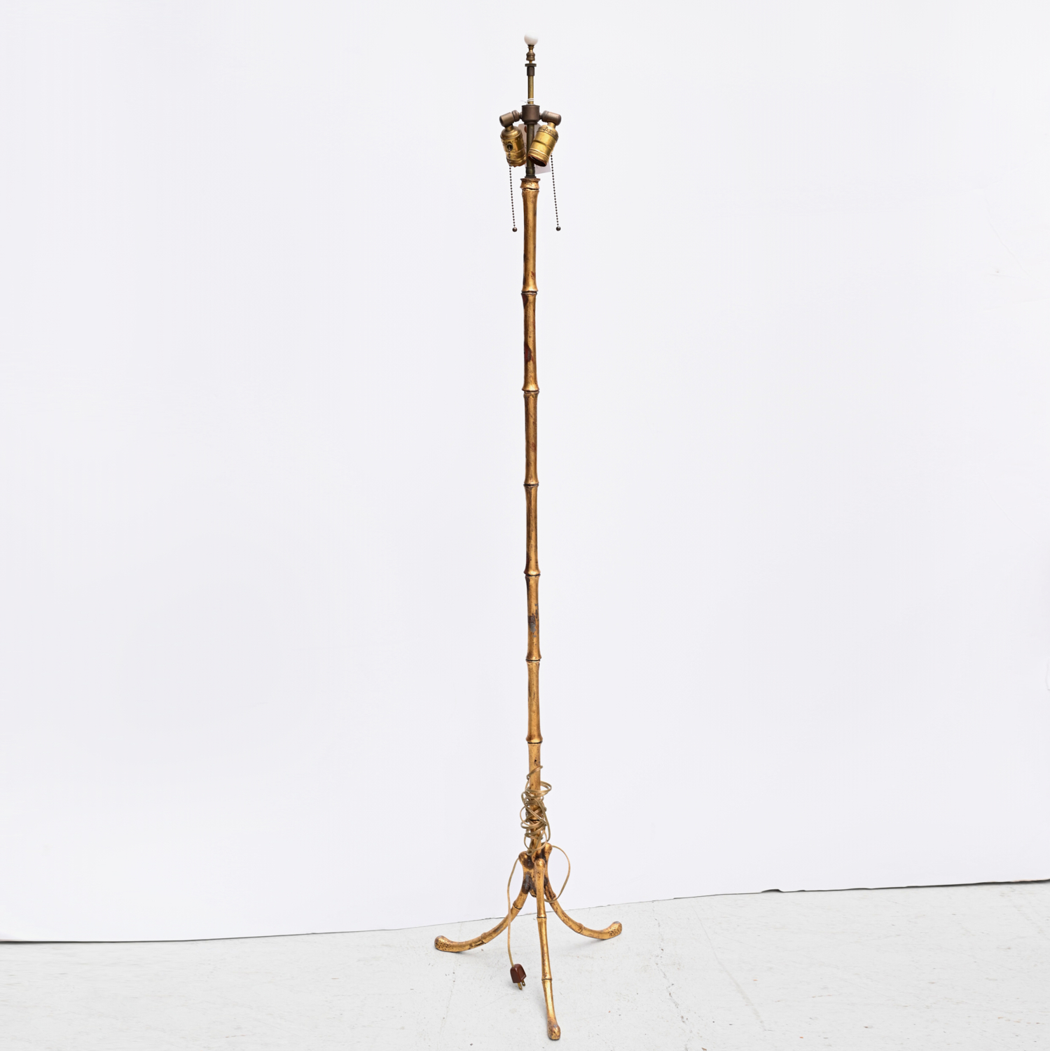 Appraisal: MODERNIST GILT METAL FAUX BAMBOO FLOOR LAMP th c two-light