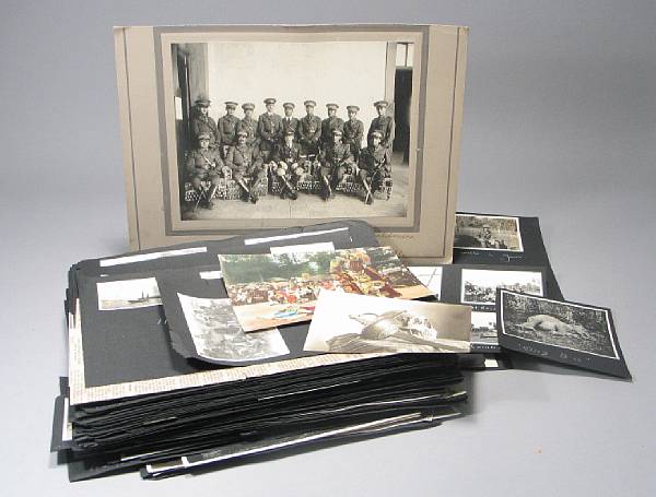 Appraisal: A photograph album of hunting scenes taken by Lt Col