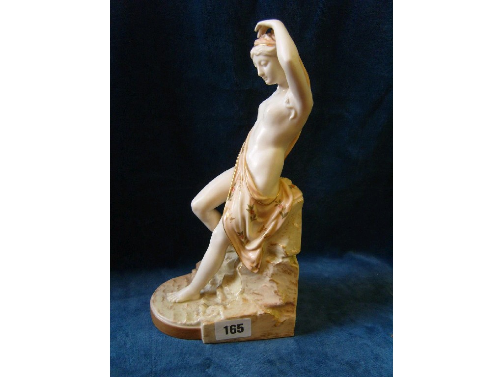 Appraisal: A Royal Worcester figure of a classically draped nude reclining