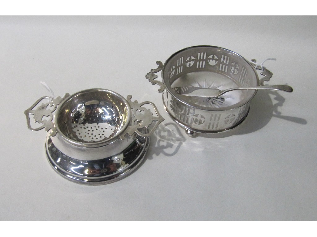 Appraisal: Lot comprising silver butter dish and tea strainer on stand