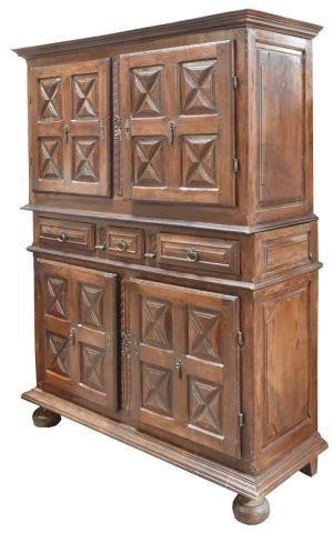 Appraisal: Spanish Baroque style oak cabinet th c molded corner over