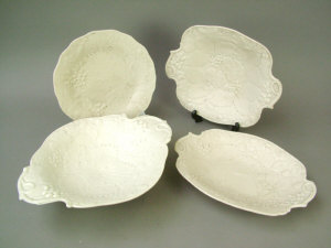 Appraisal: Blanc de chine fruit and foliage moulded part dessert service