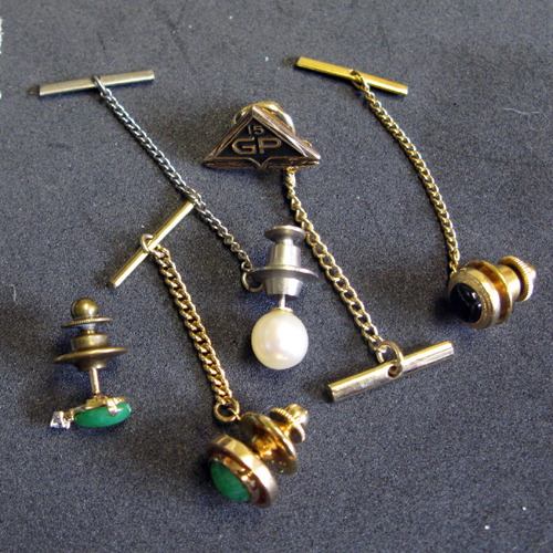 Appraisal: FIVE TIE TACKS two set with jade cabochons one with