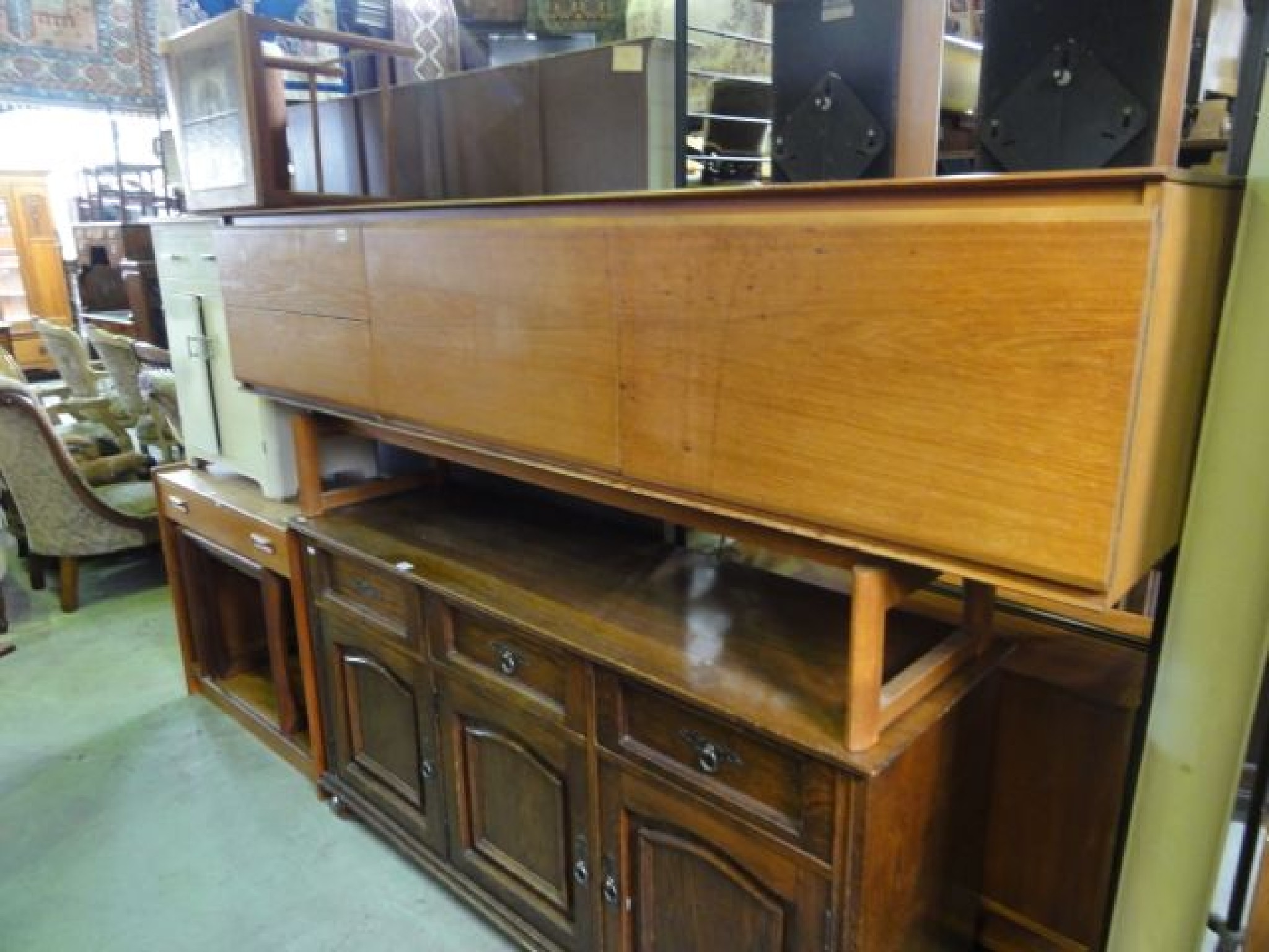 Appraisal: A mid th century long low teak sideboard by White