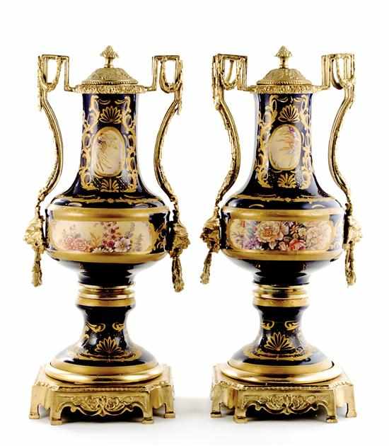 Appraisal: Pair French-style gilt-metal mounted porcelain covered urns elongated neck on