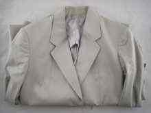 Appraisal: A lady's half lined cotton jacket with patch pockets by