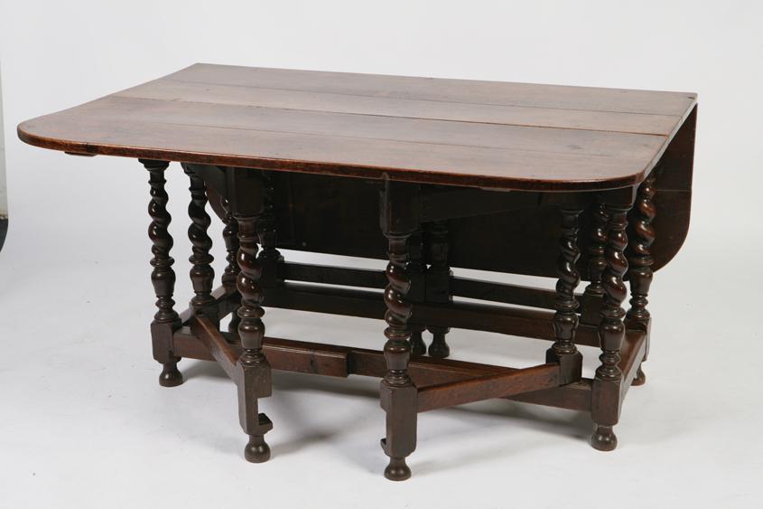 Appraisal: A LATE TH CENTURY OAK GATELEG DINING TABLE the rectangular