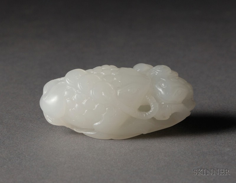 Appraisal: Jade Carving China th century pure white stone depicting a