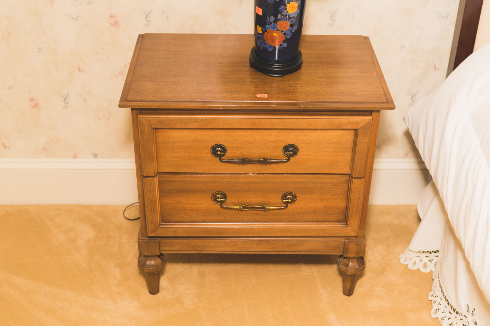 Appraisal: Neoclassical style fruitwood bachelor's chest and pair of similar bedside