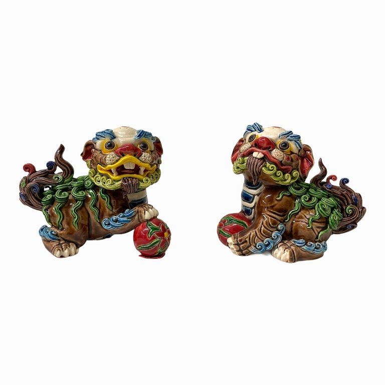 Appraisal: Pair of Decorative Foo Dogs Pair of Decorative Foo Dogs