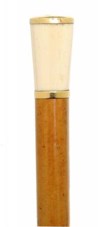 Appraisal: AN CT GOLD-MOUNTED AND IVORY-HANDLED MALACCA WALKING CANE with flared