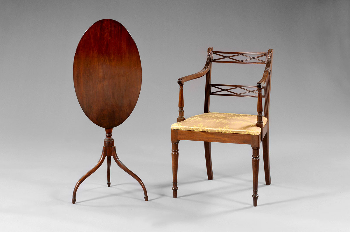 Appraisal: MASSACHUSETTS FEDERAL MAHOGANY AND BIRCH TILT-TOP CANDLESTAND The thin oval