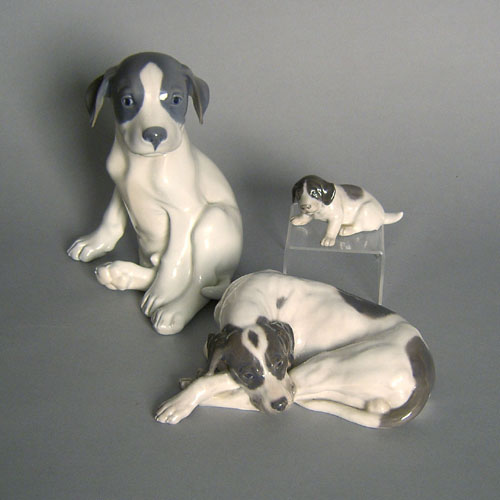 Appraisal: Three Royal Copenhagen dog figures h w and h