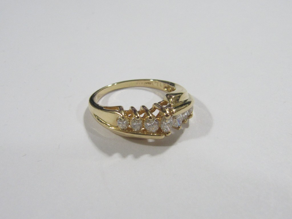 Appraisal: Fourteen carat gold diamond seven stone ring with a graduated