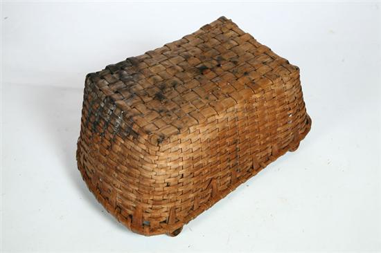 Appraisal: TWO BASKETS American late th century Includes a swing-handled basket