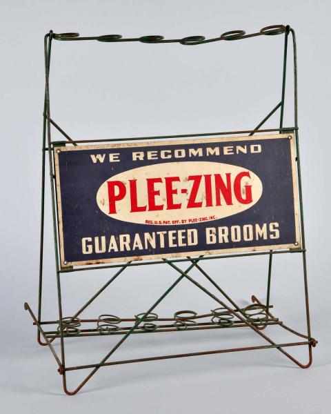 Appraisal: Metal Pee-zing Brooms Display Rack Condition Excellent Size T