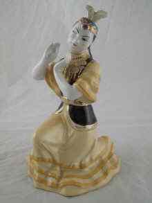 Appraisal: A Russian ceramic figure of a dancer in Khazak costume