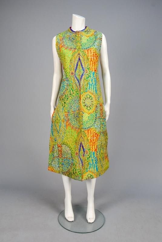 Appraisal: TINA LESER PERSIAN INSPIRED SILK TUNIC c Sleeveless open-front tabard