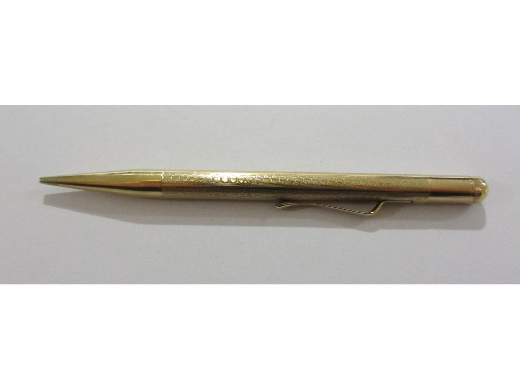 Appraisal: Nine carat gold pencil with engine turned decoration marked ct