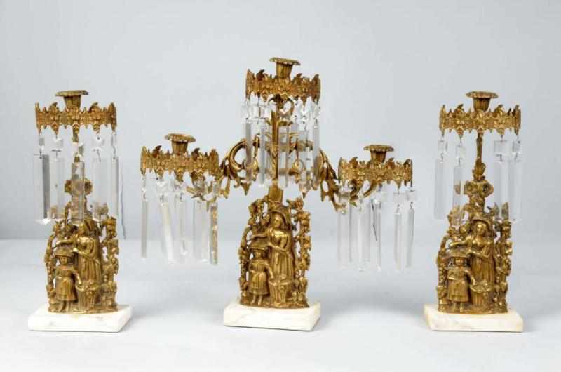 Appraisal: Brass Crystal -Piece Candelabra Description On marble bases Features a